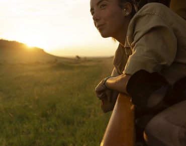 enjoying sunset on a safari tour enjoying sunset on a safari tour
